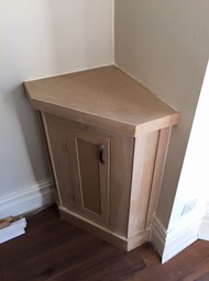 Angled front shaker style meter cupboard