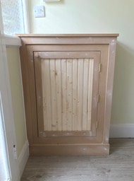 Beaded door meter cabinet in hallway