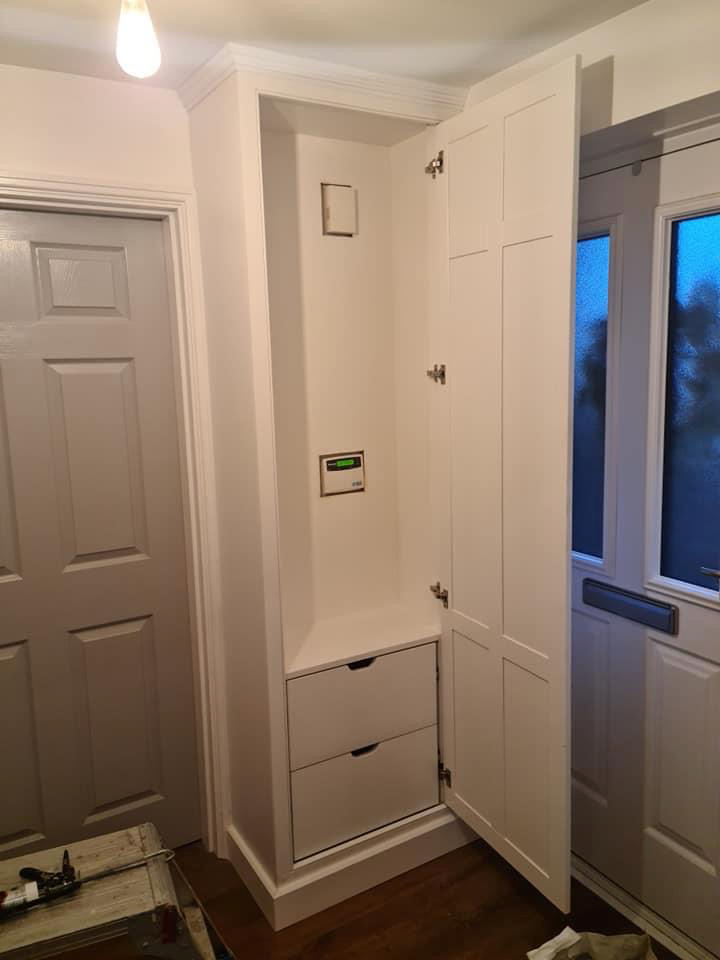Full height hallway cupboard for alarm box and coat storage