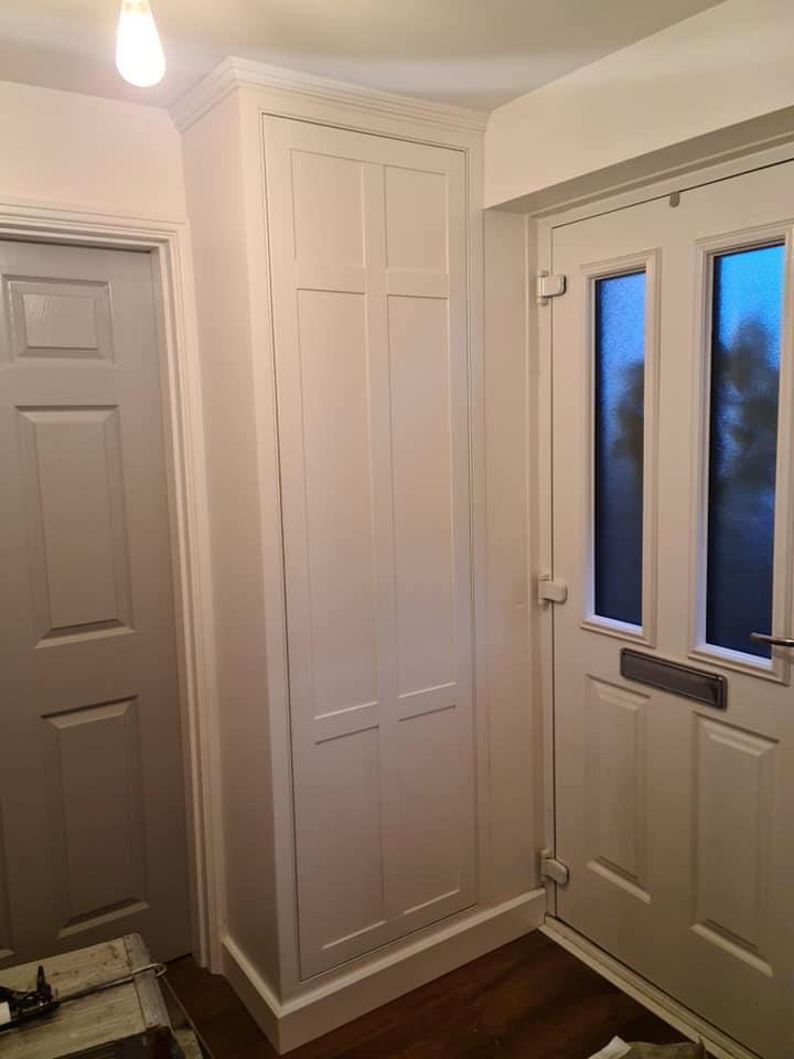 Full height meter cupboard in hallway
