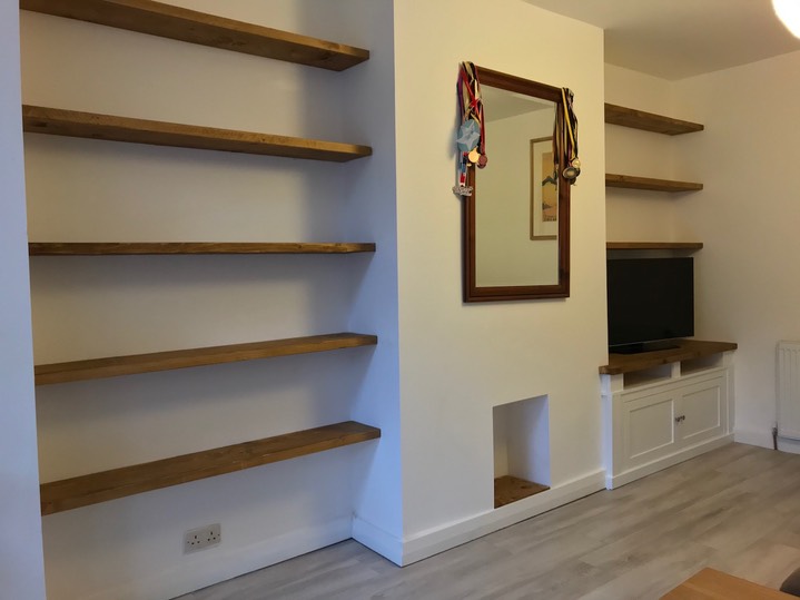 Solid wood floating shelves with white TV alcove unit Harrison Fine