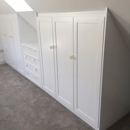 Loft conversion white wardrobes with shaker doors
