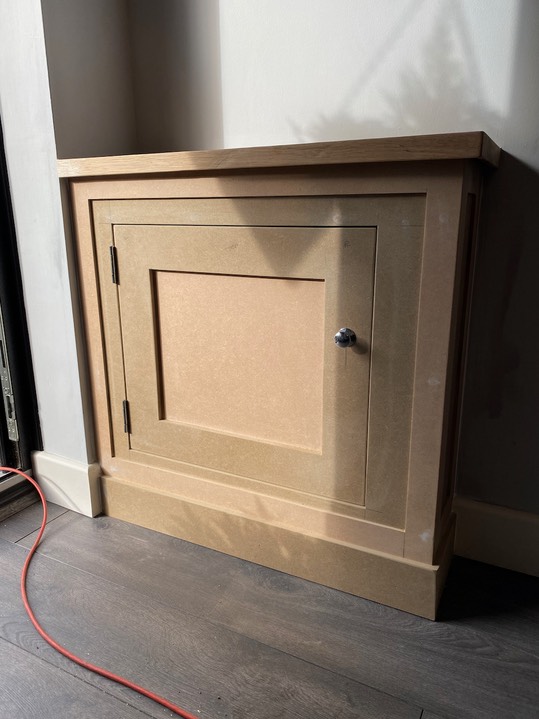 Modern shaker gas meter cupboard with white oak top