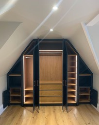 Modern wardrobes with oak internals and lighting